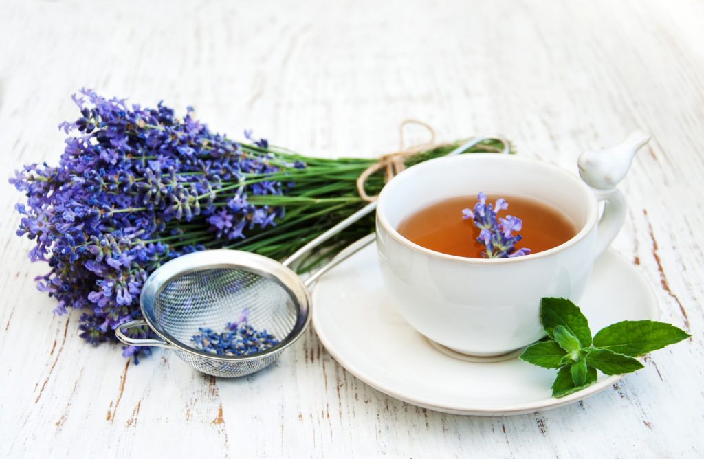 Cup of tea and lavender flowers